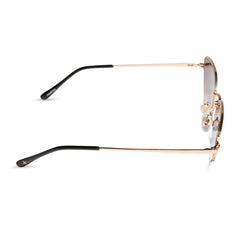 dime optics fairfax cat eye sunglasses with a brushed gold frame and sharp brown gradient lenses side view