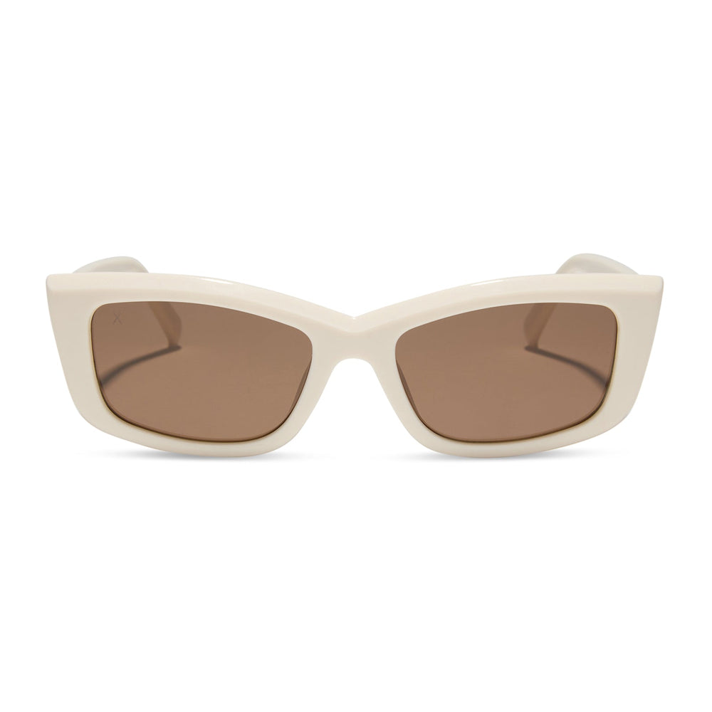 dime optics olympic cat eye sunglasses with a swiss coffee cream frame and brown polarized lenses front view