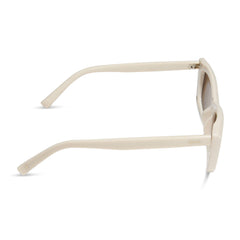 dime optics olympic cat eye sunglasses with a swiss coffee cream frame and brown polarized lenses side view