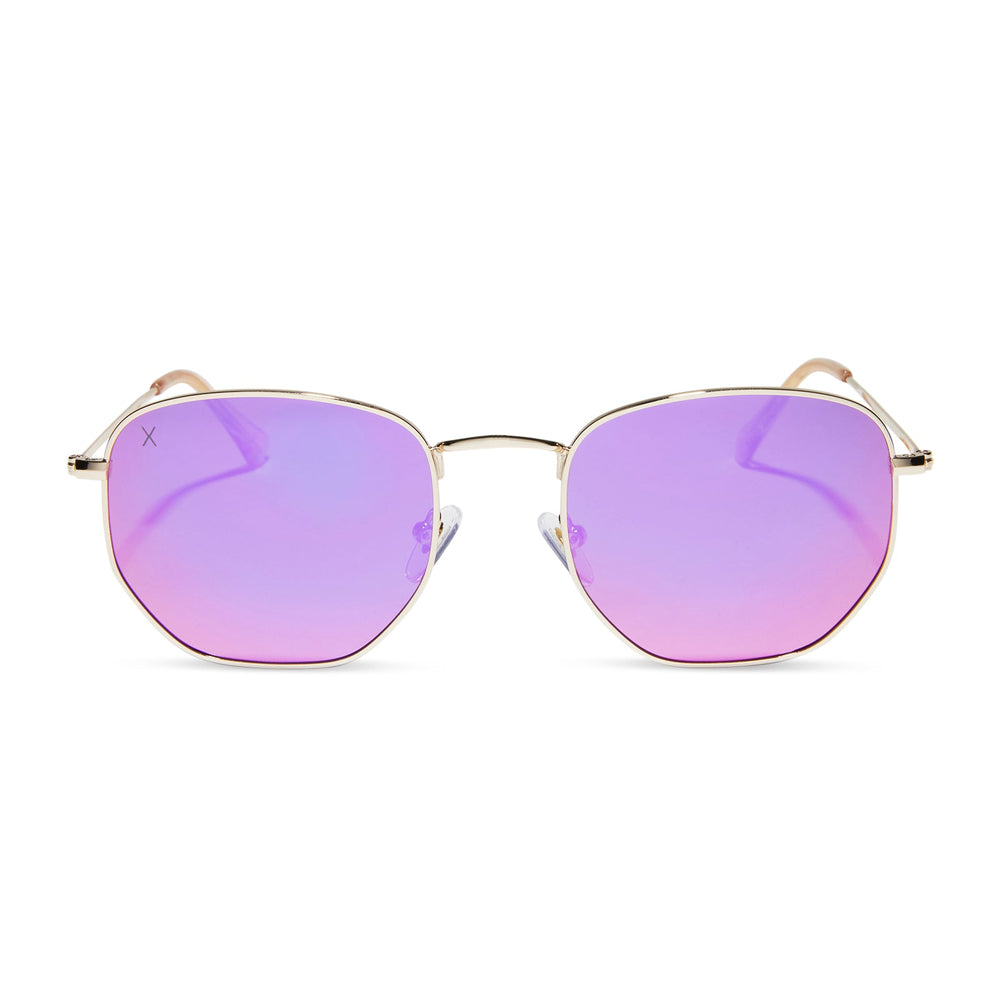 dime optics roxbury round sunglasses with a gold metal frame and candy pink mirror polarized lenses front view