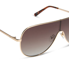 dime optics tarzana shield sunglasses with a brushed gold metal frame and brown gradient polarized lenses detailed view