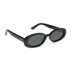 dime optics westwood round sunglasses with a black frame and grey polarized lenses angled view