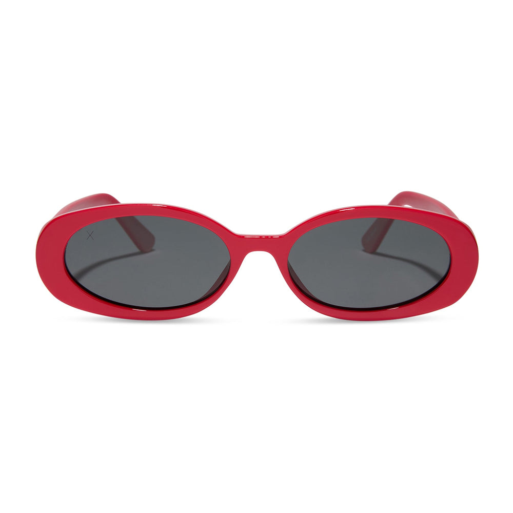 dime optics westwood round sunglasses with a ruby red frame and grey polarized lenses front view