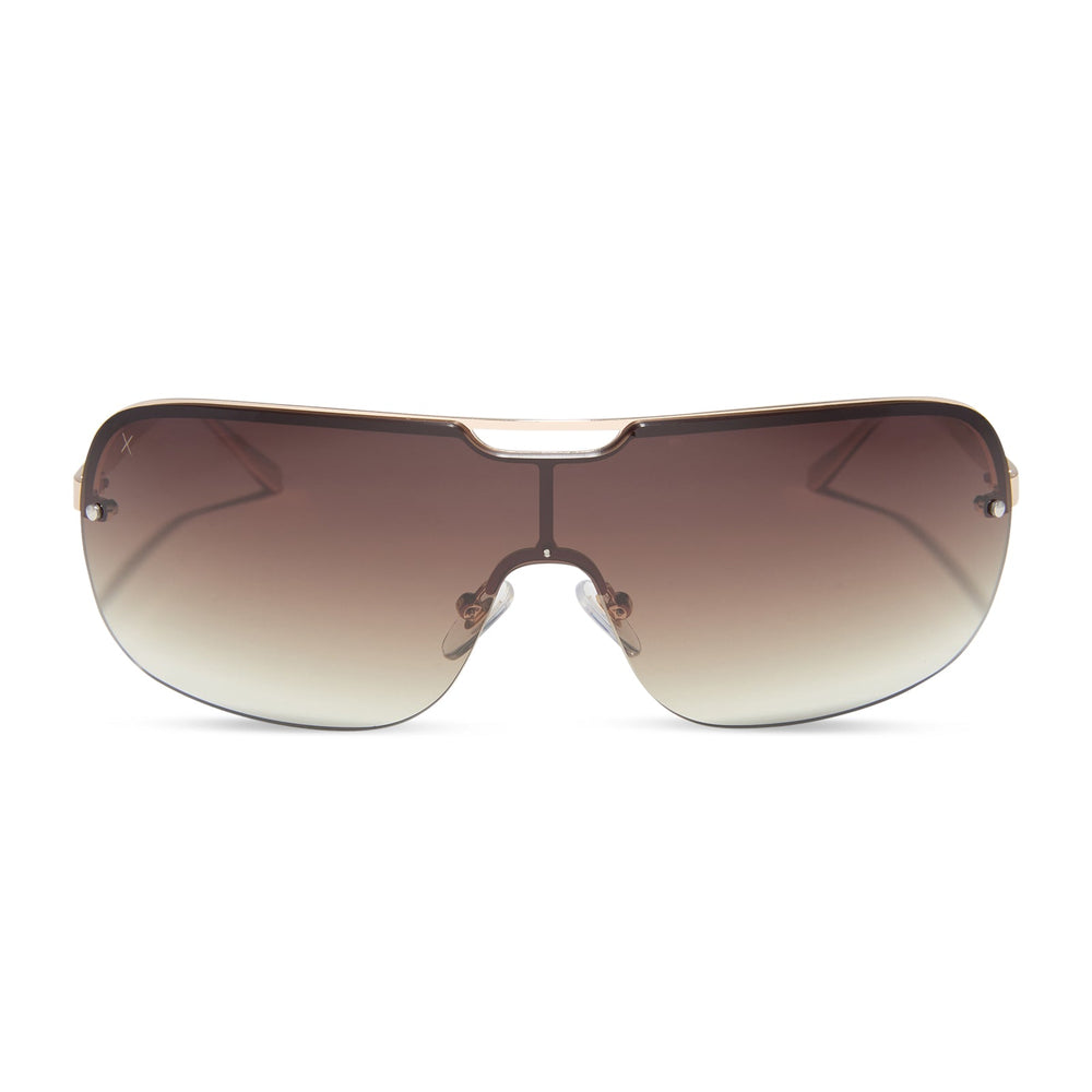 dime optics wilshire shield metal sunglasses with a shiny gold frame and brown gradient sharp lenses front view