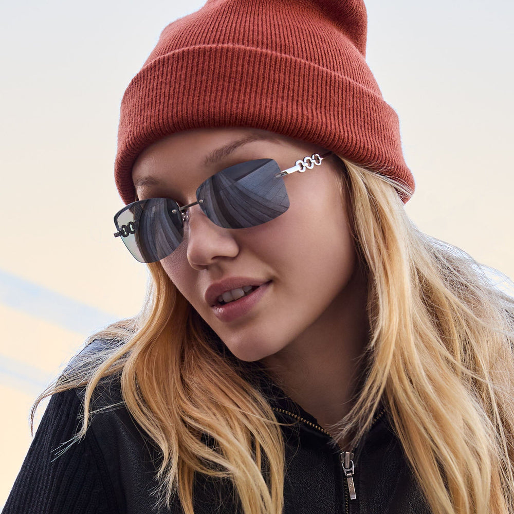 on model - blonde female wearing alondra dessy x dime optics featuring a vibe square sunglasses with a silver frame and silver mirror lenses front view