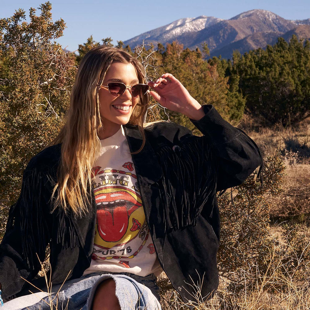 on model - blonde female outdoors wearing dime optics fairfax cat eye sunglasses with a brushed gold frame and sharp brown gradient lenses front view