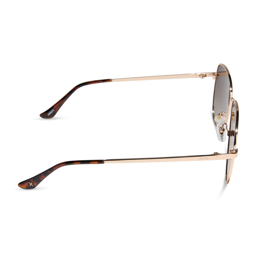 dime optics abbot aviator sunglasses with a gold frame and brown gradient polarized lenses side view
