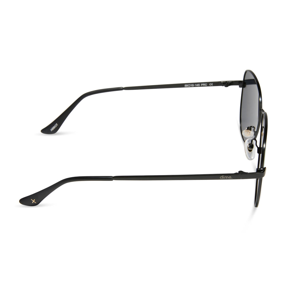 dime optics abbot aviator sunglasses with a matte black frame and pink mirror polarized lenses side view