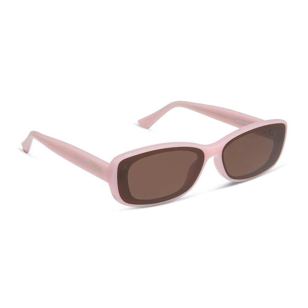 dime optics featuring the agoura rectangular sunglasses with a candy heart pink frame and brown lenses angled view