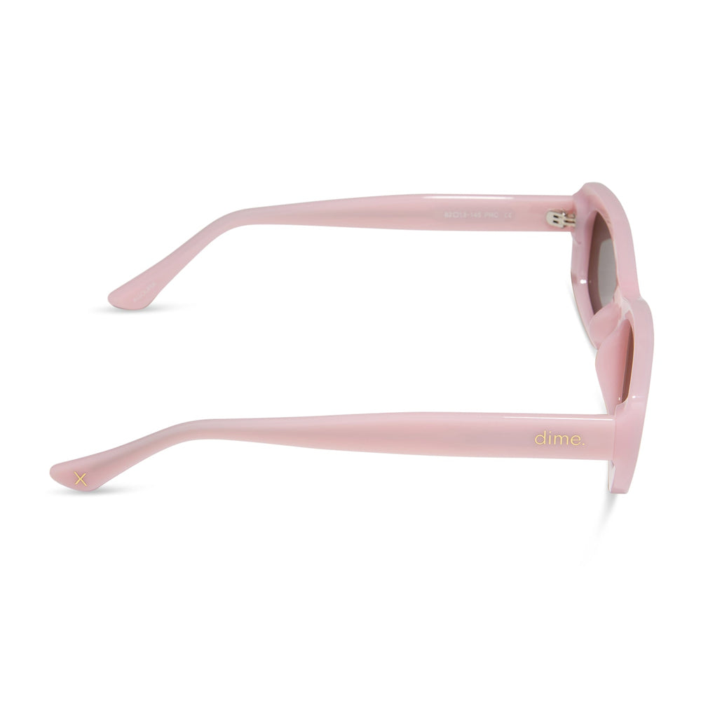 dime optics featuring the agoura rectangular sunglasses with a candy heart pink frame and brown lenses side view