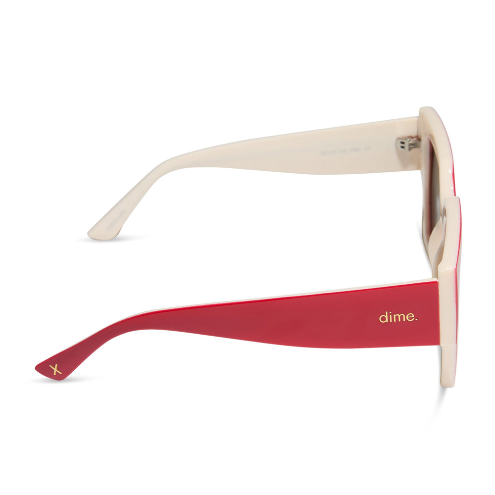 dime optics highland square sunglasses with a ruby red frame and swiss coffee grey polarized lenses side view