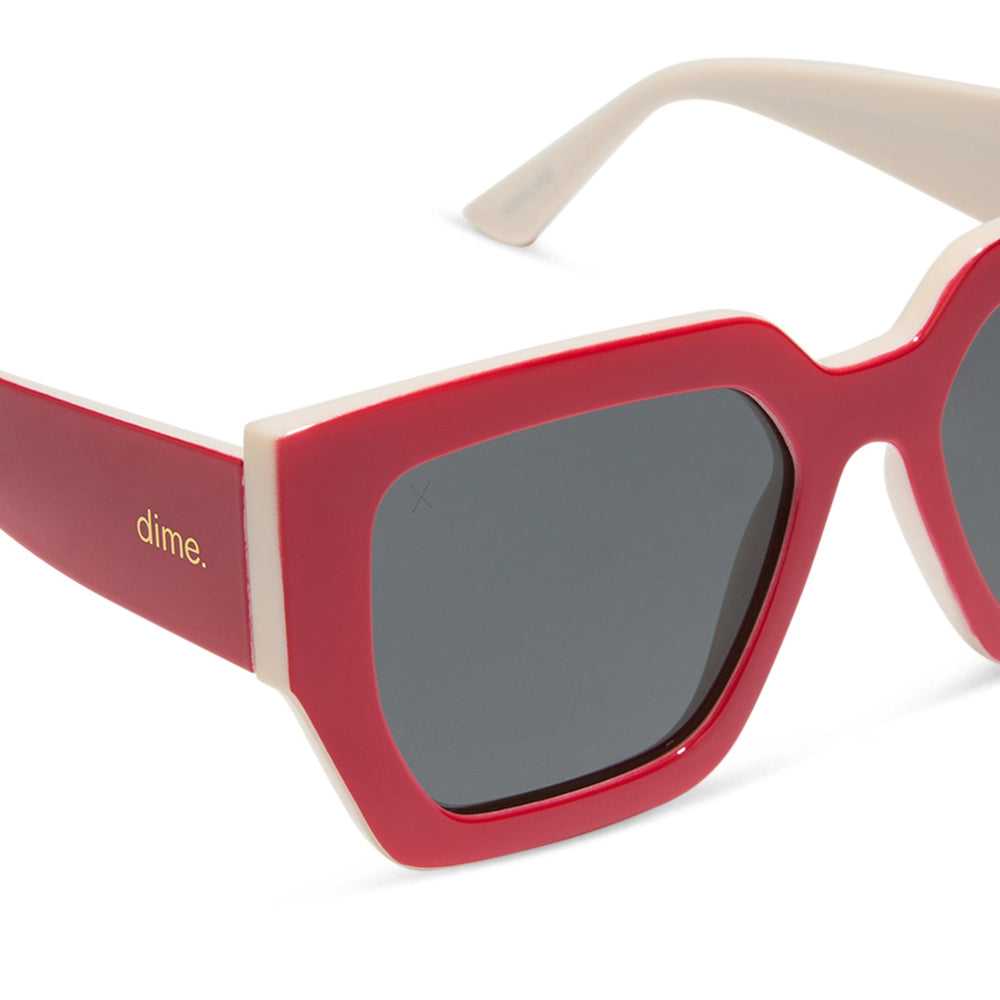 dime optics highland square sunglasses with a ruby red frame and swiss coffee grey polarized lenses detailed view