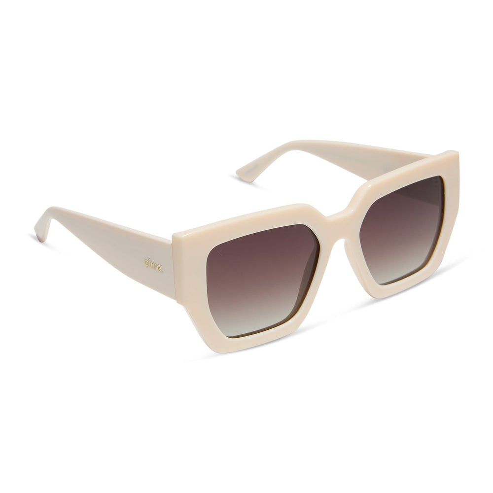 dime optics highland square sunglasses with a swiss coffee cream frame and brown gradient polarized lenses angled view