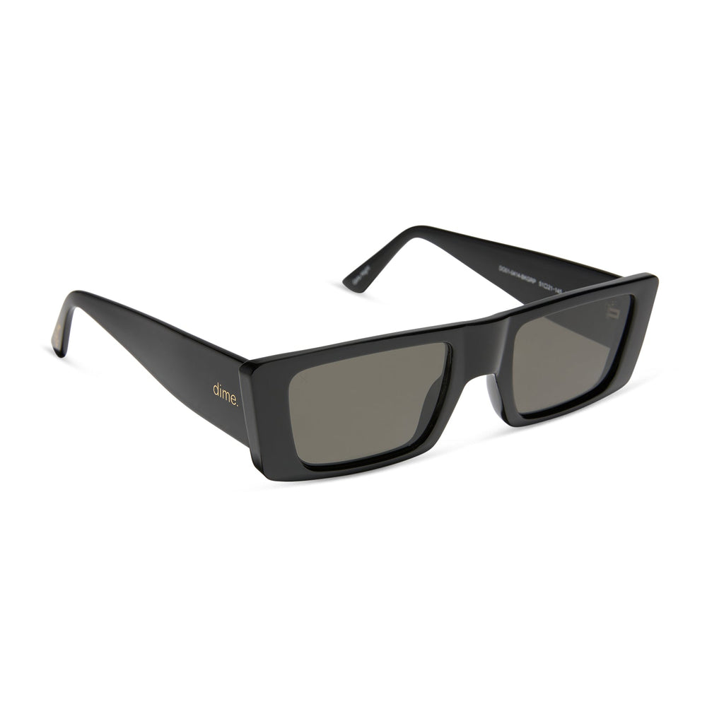 les do makeup x dime optics girls night sunglasses with a glossy black frame and grey polarized lenses angled view