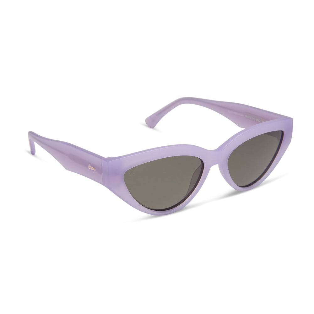 les do makeup x dime optics featuring last call cat eye sunglasses with a lavender fog crystal frame and grey polarized lenses angled view