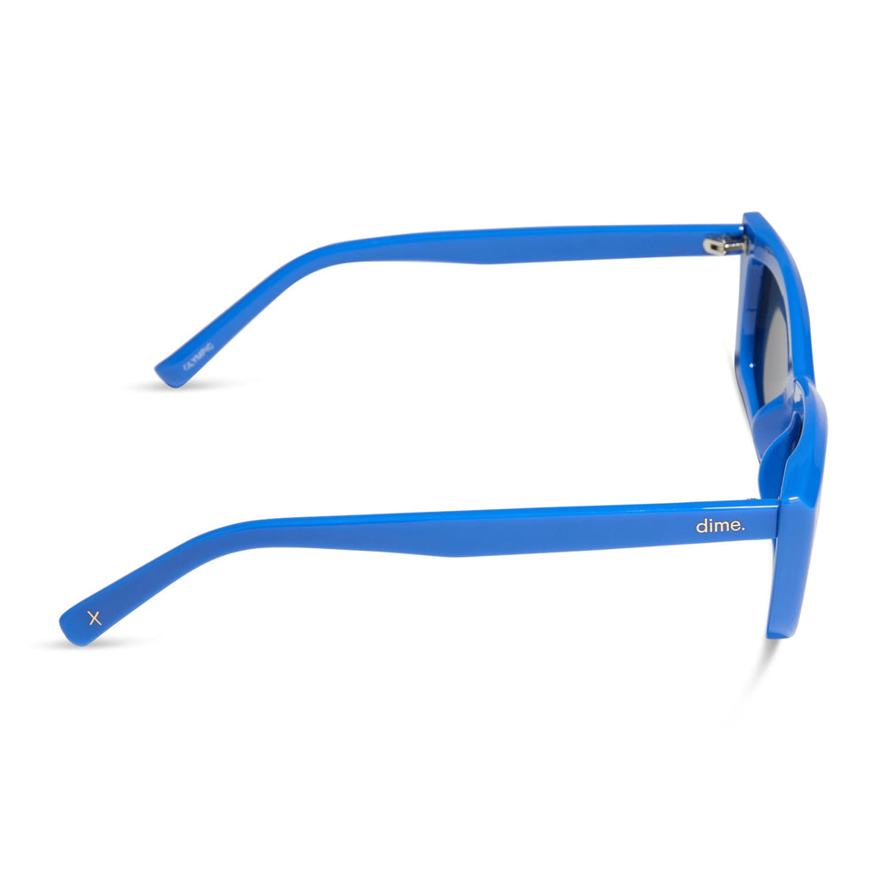 dime optics olympic cat eye sunglasses with a poolhouse blue frame and grey polarized lenses side view
