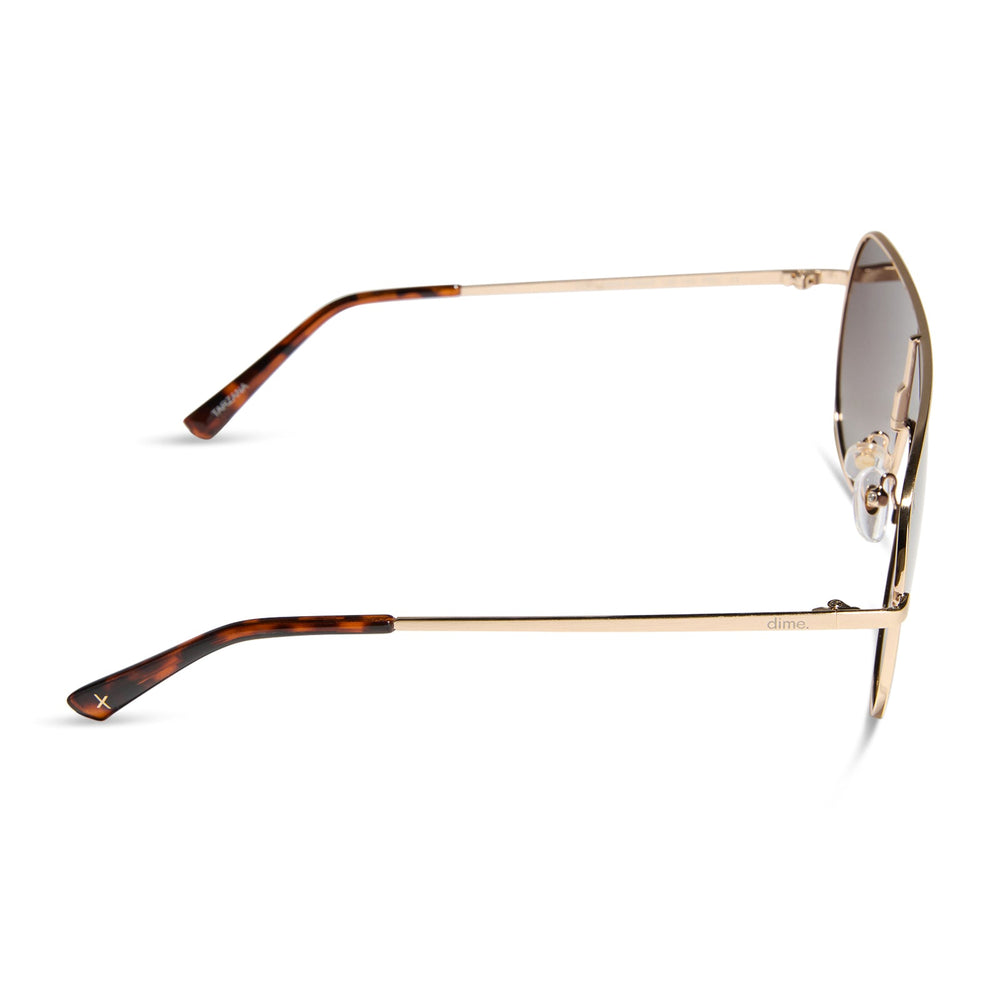 dime optics tarzana shield sunglasses with a brushed gold metal frame and brown gradient polarized lenses side view