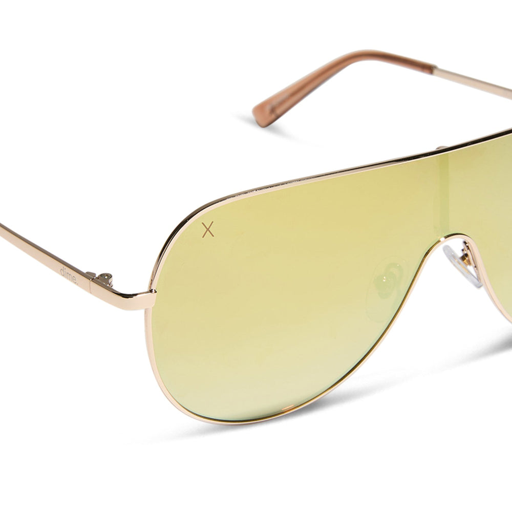 dime optics tarzana shield sunglasses with a brushed gold metal frame and gold mirror polarized lenses detailed view