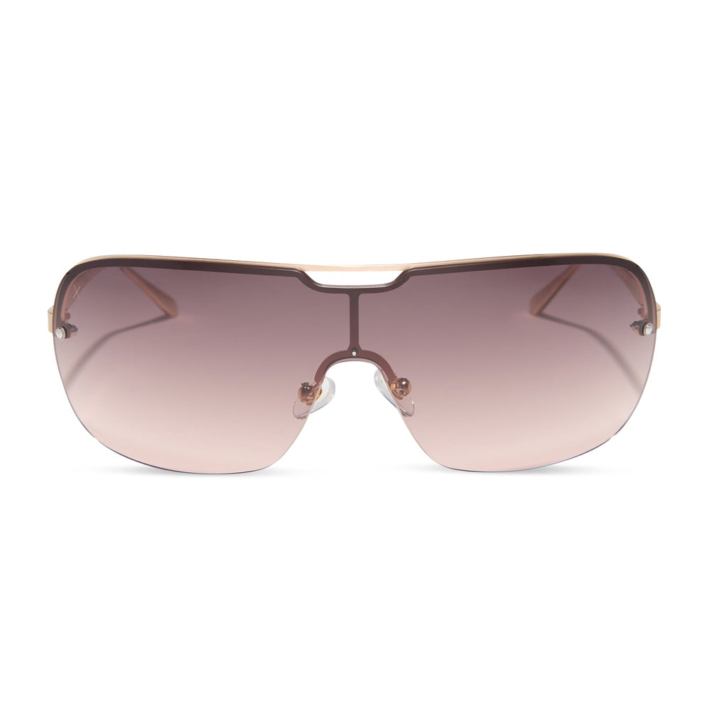 dime optics wilshire shield metal sunglasses with a brushed rose gold frame and rose gradient lenses front view
