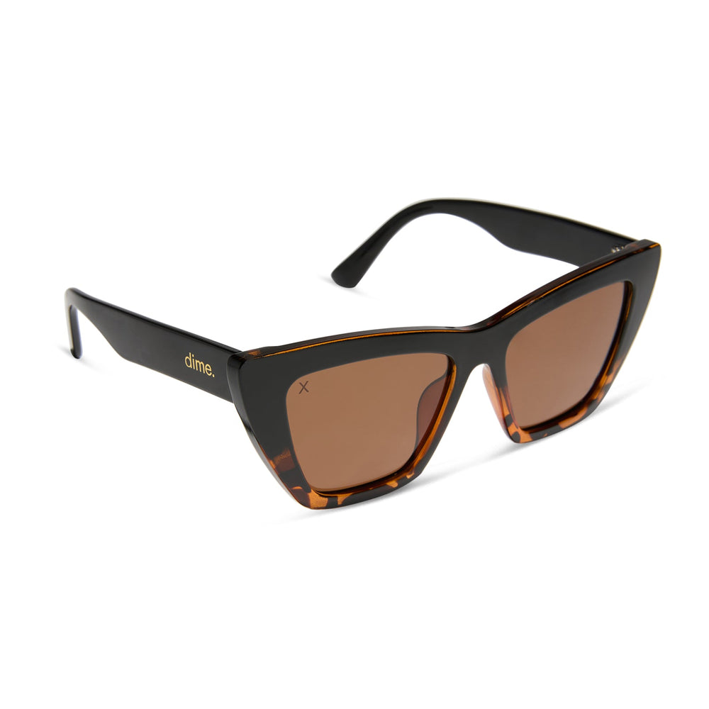 dime optics featuring the windsor cat eye sunglasses with a black tortoise frame and brown polarized lenses angled view