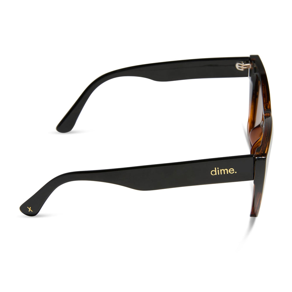 dime optics featuring the windsor cat eye sunglasses with a black tortoise frame and brown polarized lenses side view